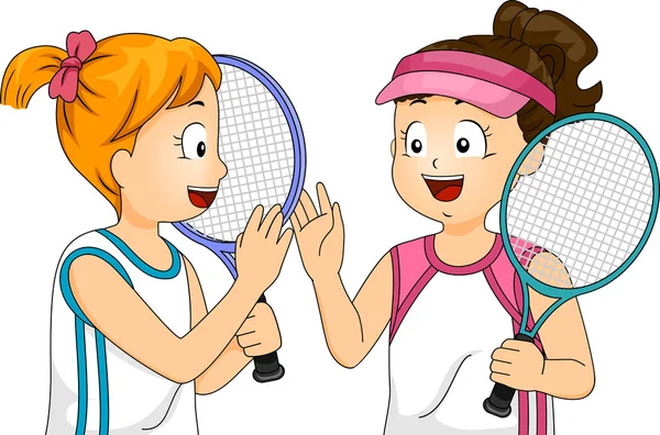 Девочки, играя в теннис — стоковое фото