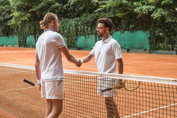 Athletic Tennis Players Wooden Rackets Shaking Hands Match Court — стоковое фото